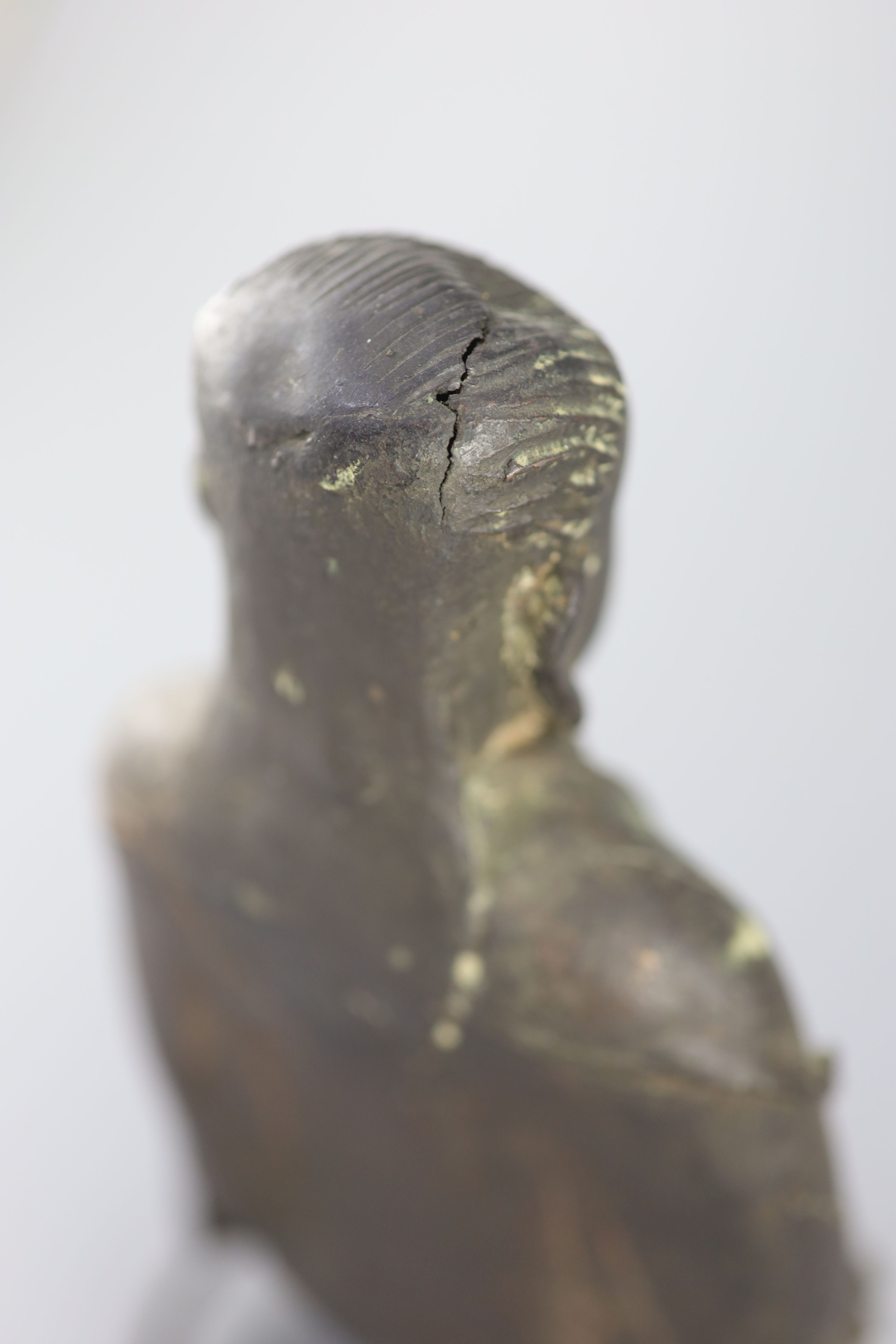 A Chinese bronze seated figure of Zhenwu, late Ming dynasty, 29cm high, casting faults, Provenance - A. T. Arber-Cooke